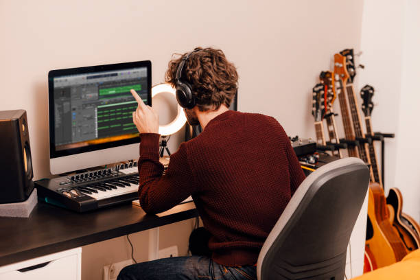 istock Music producer working at home music studio 1328299023