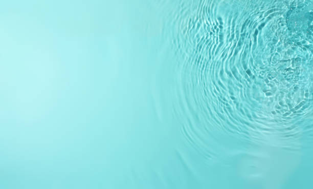 istock texture of splashing clean water on pastel background 1328299036
