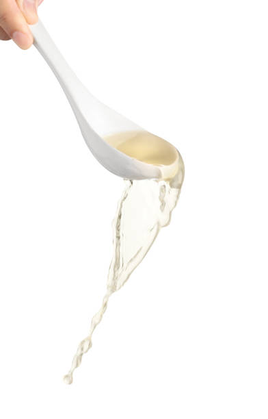 istock chef pouring noodle soup isolated on white background, Soup for sukiyaki from chicken and fish 1328299065