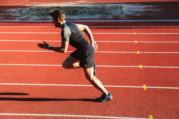 istock Motivated young sportsman running 1328301775