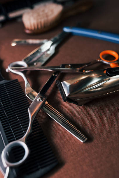 istock Close up view of vintage barber shop tools that lying down on the table 1328301975