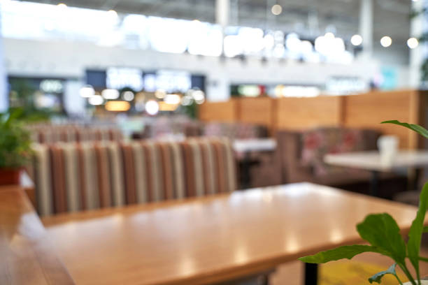 istock Empty cafe. Social distance. Separate people in restaurant. Dinner table 1328303128