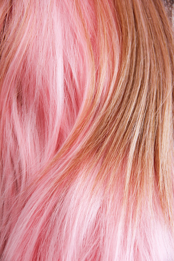 women's dyed pink hair in  curl