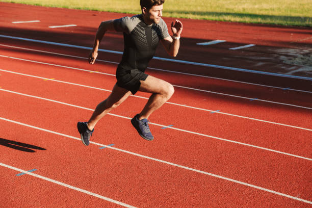 istock Fast young sportsman running 1328303620
