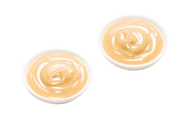 istock Mushroom sauce in a bowl isolated on white background. 1328304484