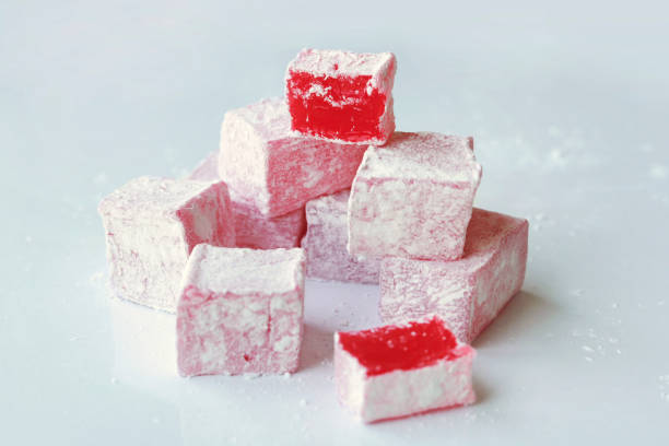 istock Sweet pieces of turkish delight on white background 1328305861