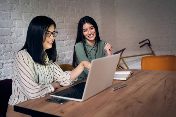 istock Young businesswomen working in a restaurant 1328306295