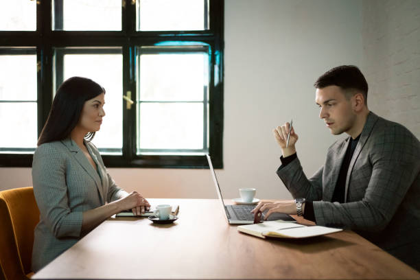 istock Woman having a job interview in a restaurant 1328306335