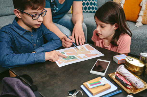 istock Mother explaining to her children the emergency assembly point 1328306665