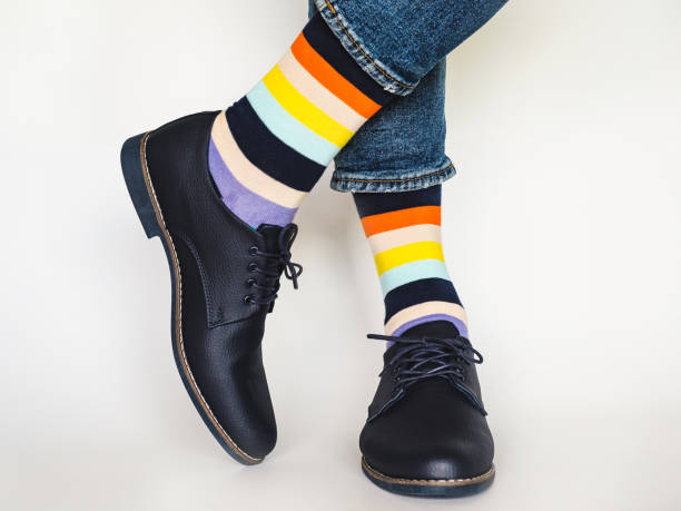 istock Men's legs, trendy shoes and bright socks 1328308616