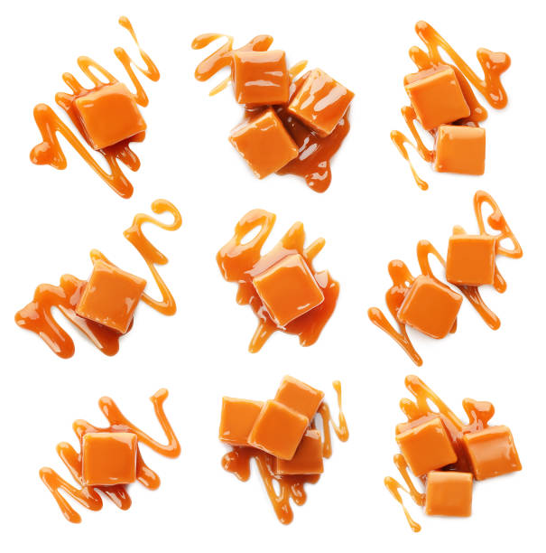 Set of delicious caramel candies with sauce on white background, top view Set of delicious caramel candies with sauce on white background, top view caramel stock pictures, royalty-free photos & images