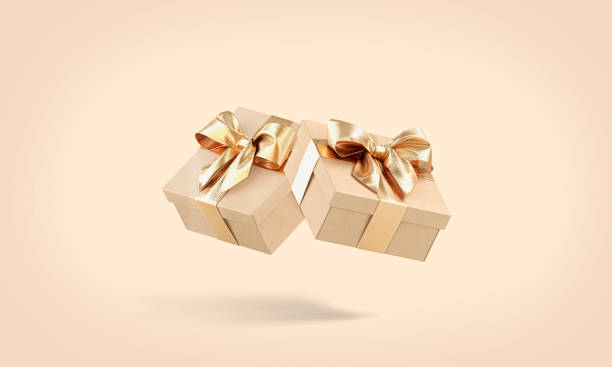 Blank gold gift box with ribbon mockup, no gravity Blank gold gift box with ribbon mockup, no gravity, 3d rendering. Empty square creative package mock up, isolated. Clear carton handmade container for anniversary present template. unusual basket stock pictures, royalty-free photos & images