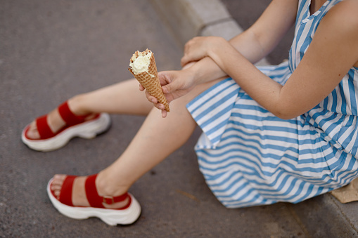 A girl holding an ice cream