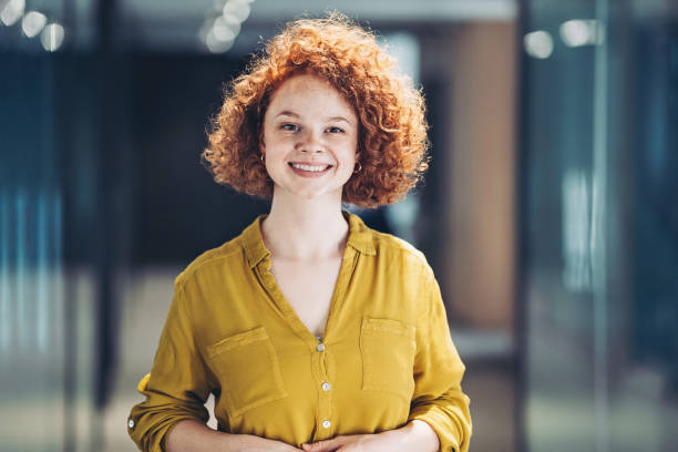 istock Cheerful young redhead businesswoman 1328313968