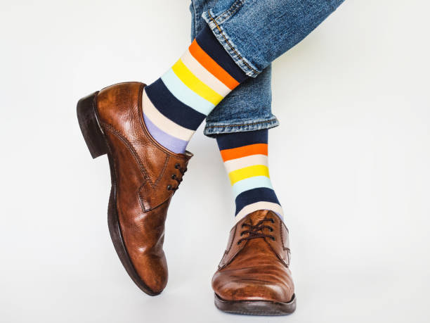 men's legs, trendy shoes and bright socks - business men humor macho imagens e fotografias de stock