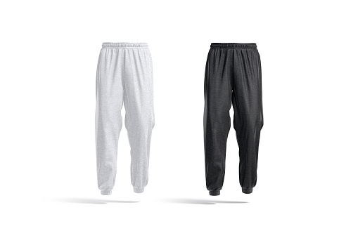 Blank black and white sport sweatpants mockup, front view, 3d rendering. Empty fabric joggers for sporty outfit mock up, isolated. Clear male or female jersey trackpants or slacks template.