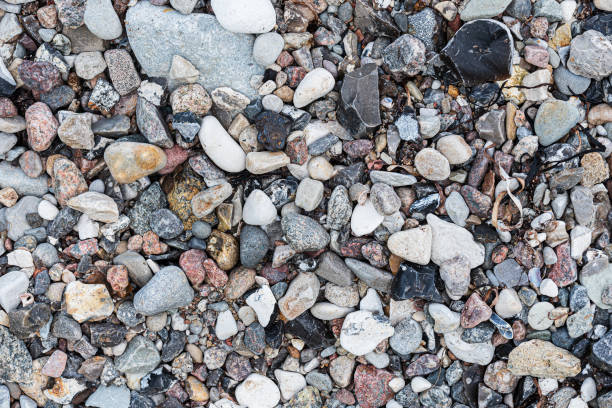 top view of pebbles or stones on beach, full-frame nature background