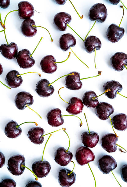 istock Cherry fruits fresh with dew water drops isolated on white 1328323776