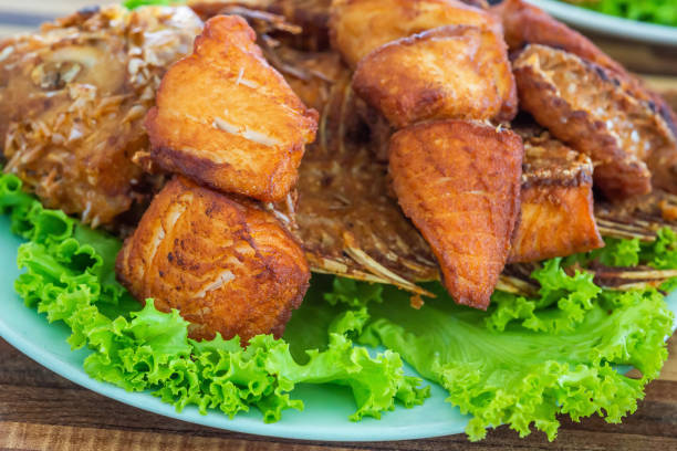 istock Fried fish with vegetable on dish. Local food in Thailand. 1328323867