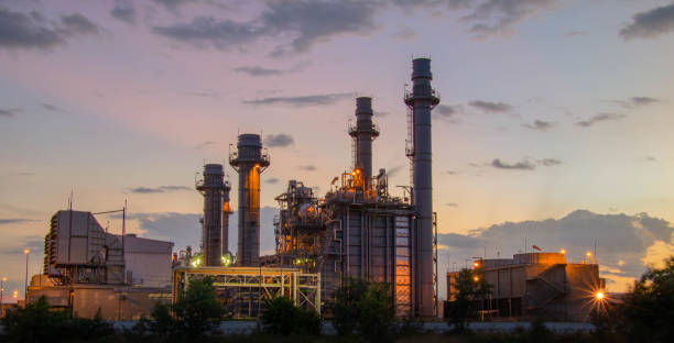 natural gas combined cycle power plant ,gas turbine electrical power plant with in twilight power for factory energy concept. - energiecentrale stockfoto's en -beelden