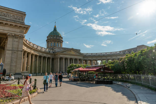 Saint Petersburg, Russia - June 7, 2021: Kazan Cathedral and a colonnade in a summer day with people walking around