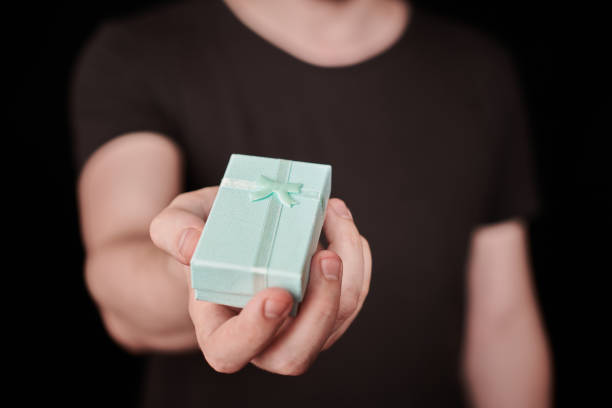istock Gift box in hand on St. Valentine day 1328327424