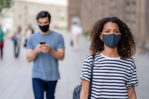 istock People with mask during pandemic 1328327515