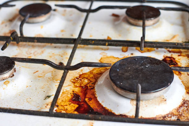 istock Dirty stove with food leftovers 1328328957