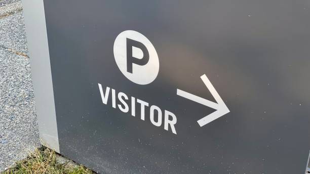 istock Visitor parking lot destination arrow 1328332799
