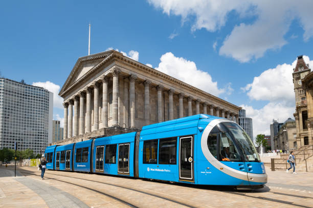 West Midlands Metro, Birmingham, England, UK Birmingham, England - 08 July 2021: A blue West Midlands Metro tram at in front of Town Hall in Victoria Square, Birmingham, England, UK. midlands england stock pictures, royalty-free photos & images