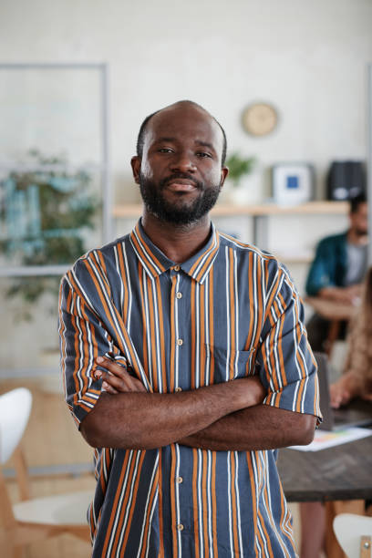 istock African businessman standing at office 1328336327