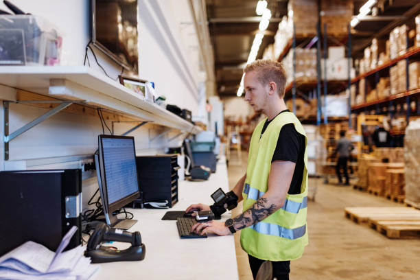istock Warehouse employees checking the supply in warehouse 1328336539