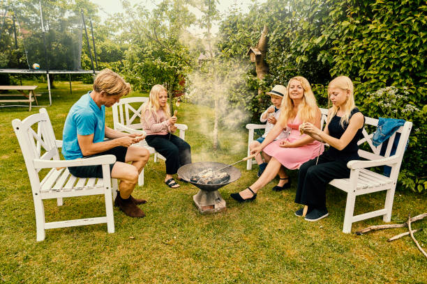 istock Family having a cozy dinner in garden 1328336604