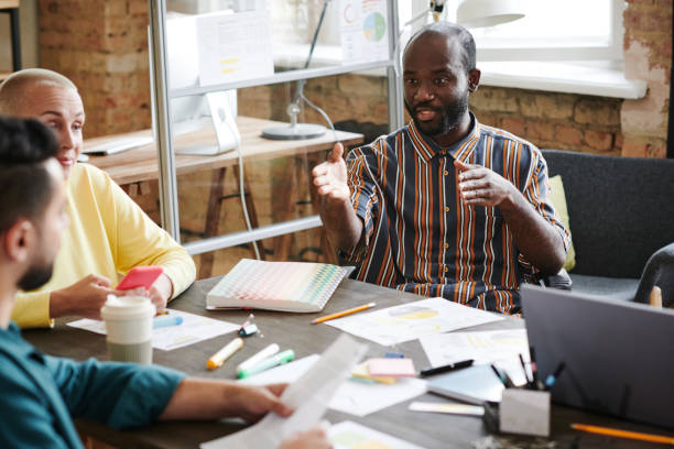 istock Business people sitting at meeting at office 1328336768