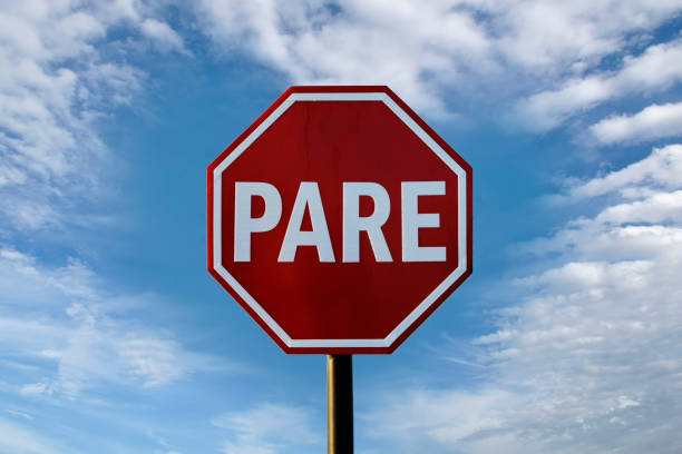 istock mandatory stop sign, in Portuguese PARE 1328338053