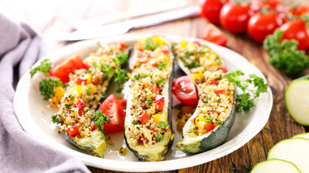 istock baked zucchini sliced with vegetables 1328341165