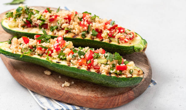 istock Grilled zucchini stuffed with couscous and vegetables 1328342912