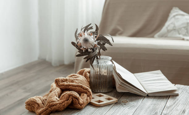 istock Cozy home still life with a book and decorative elements. 1328343273
