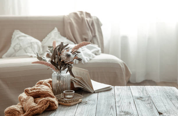 istock Cozy home still life with a book and decorative elements. 1328343274