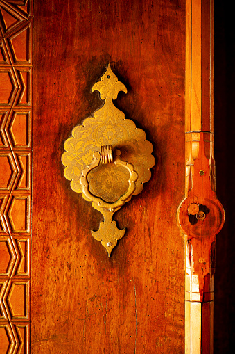Doorknob of wooden gate of Selimiye Mosque which is in UNESCO World Heritage List..  Edirne, Turkey.