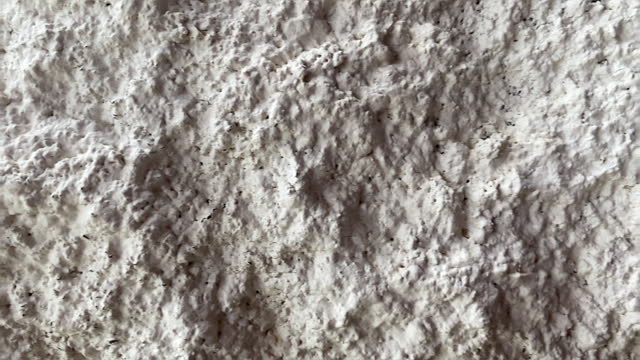 Close Up of A White Rough Concrete Wall