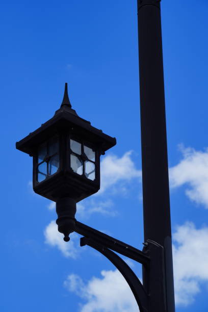 istock Street light against a bright cloudy sky 1328348581