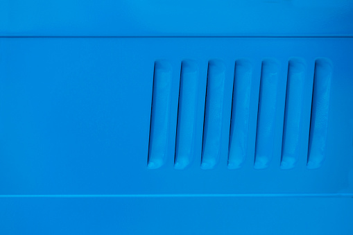 Blue steel panel with ventilation holes