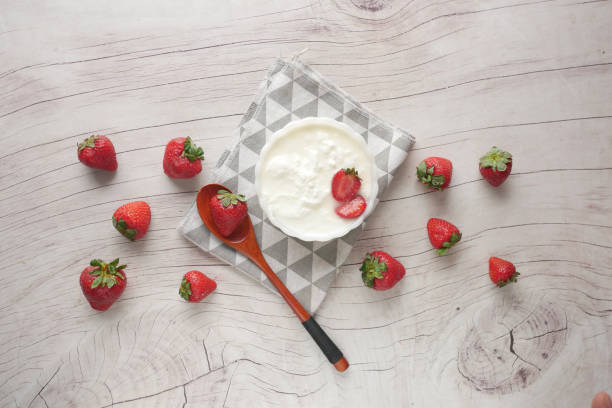 istock fresh strawberry and yogurt in a bowl on table 1328351839