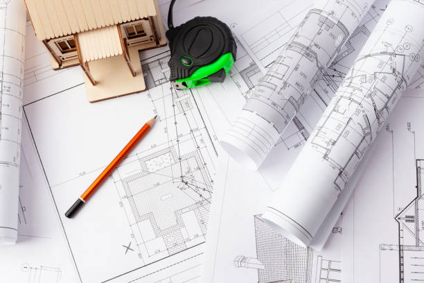 istock designing a wooden private house turnkey. Copy space 1328354995