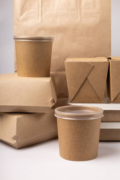 istock Disposable food delivery packaging on gray background 1328357289