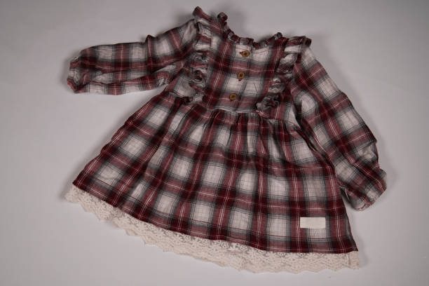 istock Plaid baby clothes, white background 1328358961