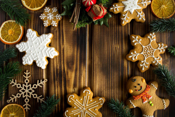 istock Christmas composition  with gingerbread on the wooden background 1328359018