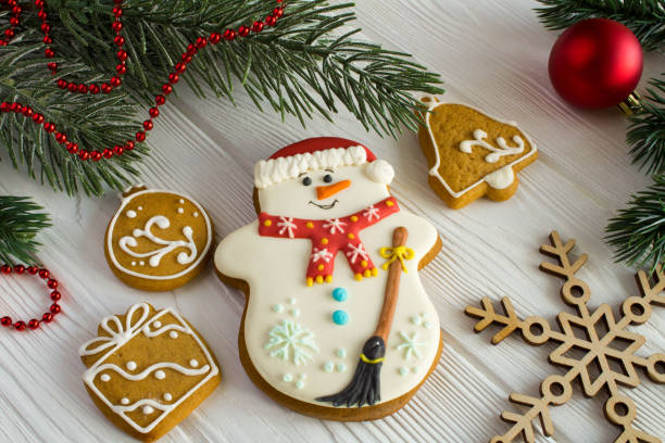 istock Christmas composition with gingerbread on the  white wooden background 1328359072