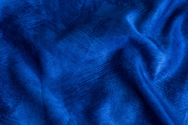 istock rinkled blue cotton fabric with visible texture 1328359164
